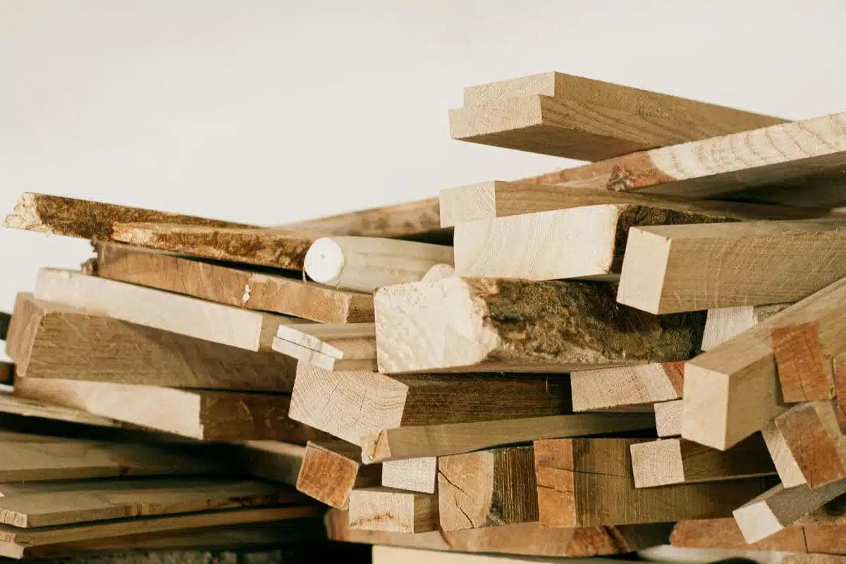 Brown Wooden Log Stack on White Background