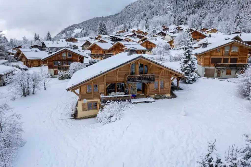 A Wooden Houses on a Snow Covered Ground