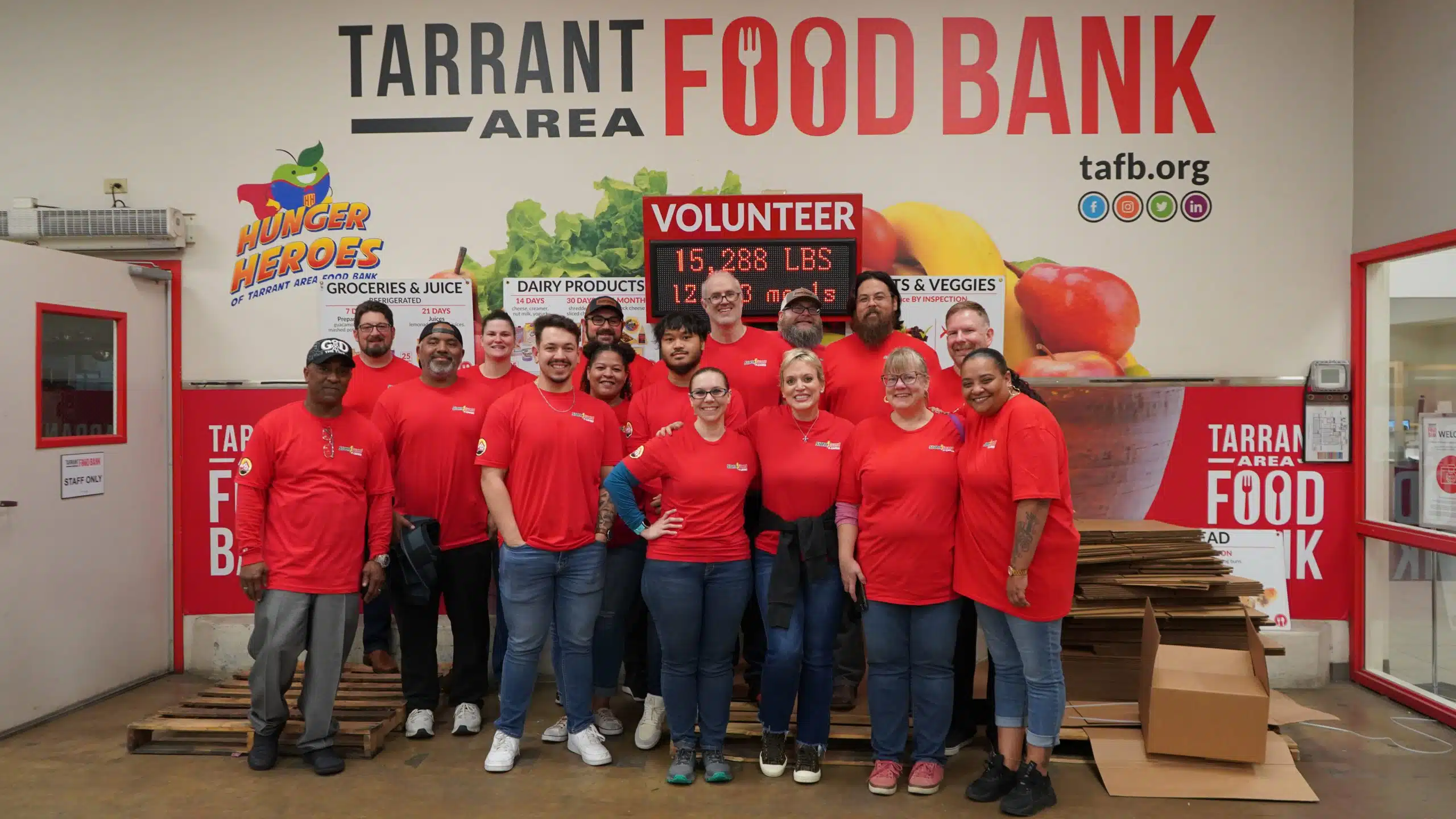 stormguard team donates $5,000 and volunteers at tarrant area food bank