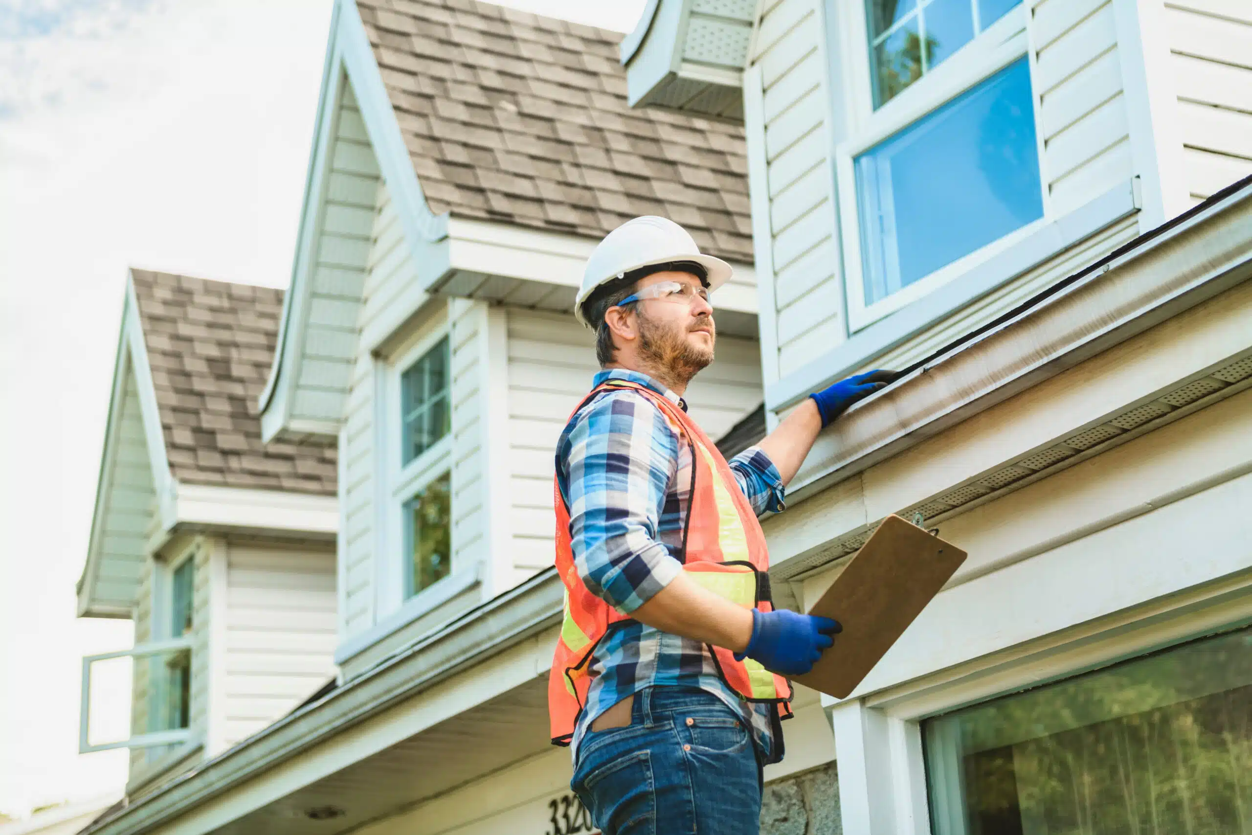 person repairing residential roof